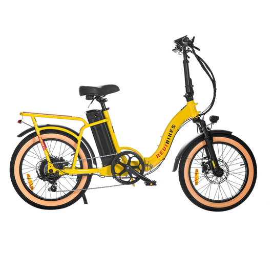Yellow eBike Revi Rebel.2 electric bicycle side view with black tires and battery pack