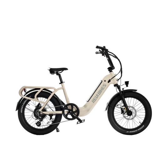 Cream-colored eBike Revi Runabout.2 electric bicycle, side view, against a plain background.