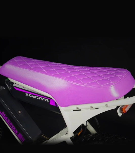 Purple quilted seat for Macfox X1S eBike, shown in close-up with detailed stitching and textured surface.