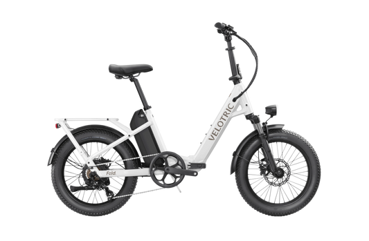Pearl White Velotric Fold 1 eBike, folded, side view, against a plain background