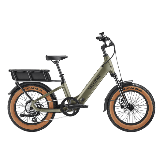 Velotric GoMad eBike in Sage color, side view, showcasing its frame, wheels, and battery.