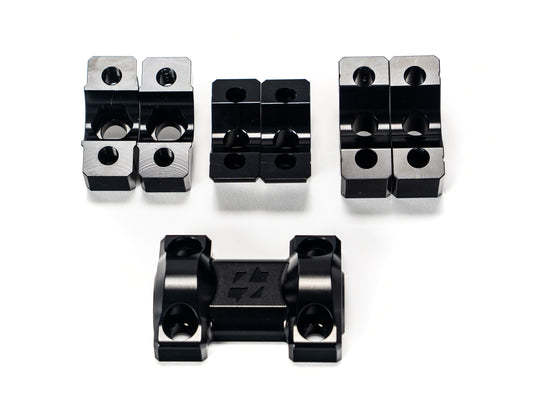 Stomp Ebox Dragster RS Suspension Upgrade Kit components displayed on a white background, including shock absorbers, mounting hardware, and springs.
