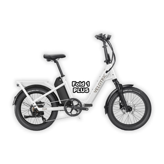 Velotric Fold 1 PLUS eBike in Pearl White, folded and placed inside its box, product image on a white background