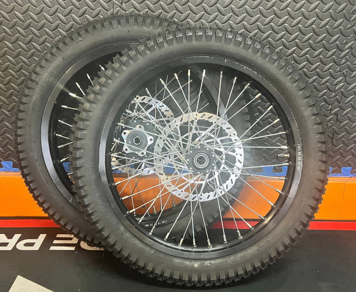 eMoto Shinko 241 Dual Sport 17"/17" front and rear wheel and tire set for eMoto moto bikes, delivering outstanding traction and performance on both off-road trails and on-road surfaces, designed for durability and smooth handling in all conditions.