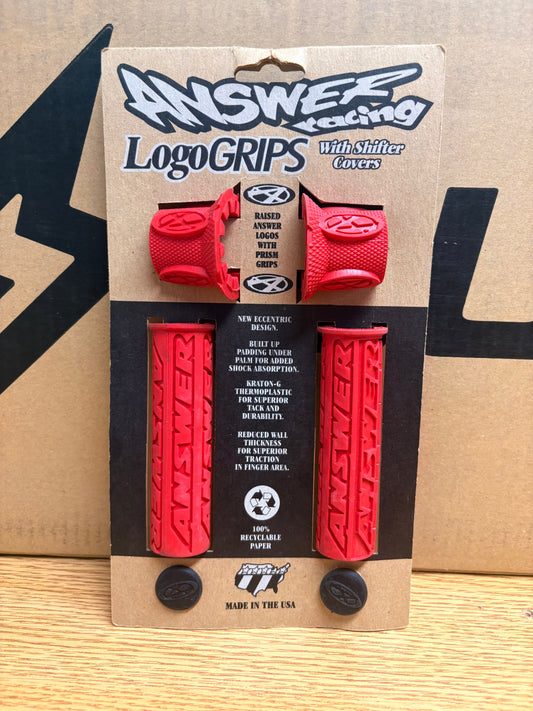 Red Answer Racing eBike grips, product image showing a pair of red handlebar grips designed for electric bikes.
