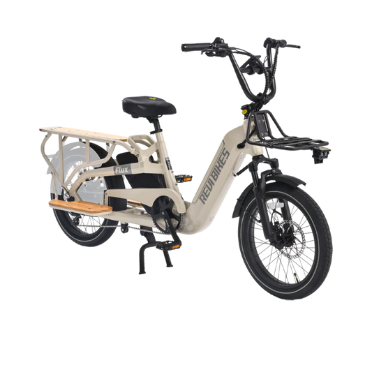 Cream-colored eBike Revi Flux electric bicycle, side view, against a plain background
