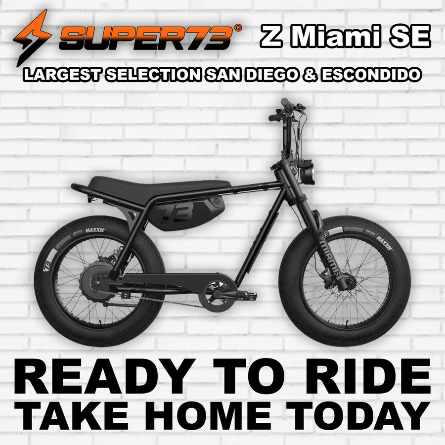 Super73 Z Miami SE electric bike in R2R Blackout color, side view, black frame with minimalist design, thick tires, and compact build.