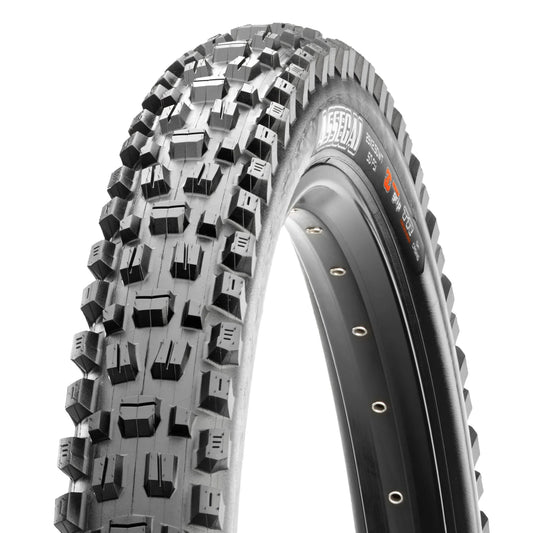 Maxxis Assegai 29x2.50 eBike tire, black tread with prominent side knobs, displayed upright against a white background