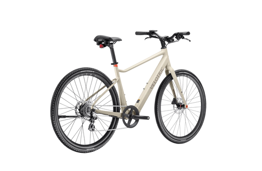 Velotric T1 ST Plus electric bike in sand color, side view, isolated on white background