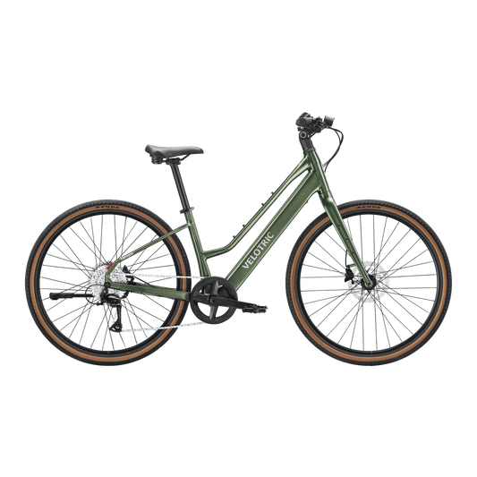 Velotric Tempo Mid Step eBike in Forest Evergreen color, side view, displayed outdoors