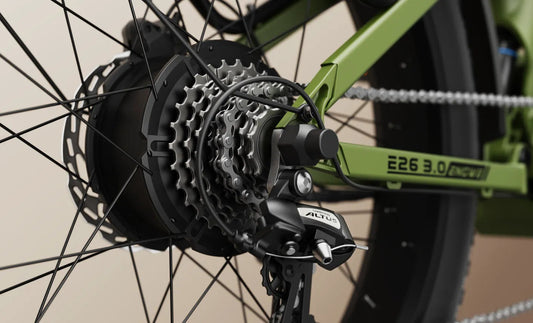 Electric bicycle ENGWE E26 3.0 in black, shown from a side angle with thick tires, front suspension, and rear rack, set against a plain background.