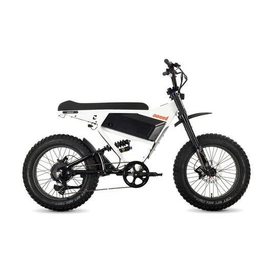 Juiced Scrambler full suspension electric bike in white cherry color with a single battery, side view