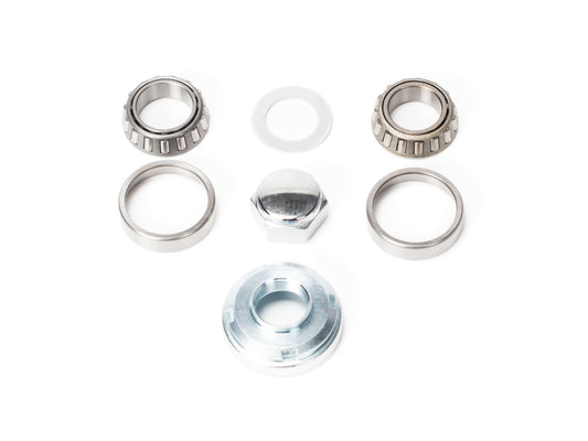 Stomp Ebox Headset Kit components displayed on a white background, including headset bearings, spacers, and top cap.